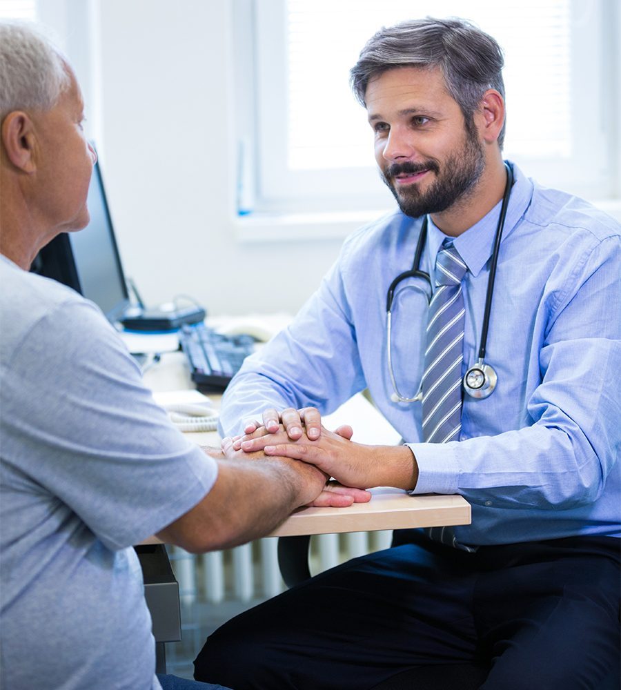 male doctor examining a patient